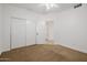 Bedroom featuring an attached bath and large closet with mirrored doors at 1625 W Gunstock Loop, Chandler, AZ 85286