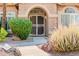 Inviting home entrance with stone accents, desert landscaping, and a secure screen door, number 1625 at 1625 W Gunstock Loop, Chandler, AZ 85286