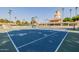 Another well-maintained tennis court with lights and fencing, providing a secure and enjoyable play area at 1625 W Gunstock Loop, Chandler, AZ 85286
