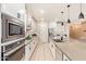 Gorgeous kitchen with stainless steel appliances and plenty of counter space at 18630 W Lawrence Ln, Waddell, AZ 85355