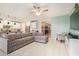 Open-concept living room flowing into a modern kitchen, perfect for entertaining at 18630 W Lawrence Ln, Waddell, AZ 85355