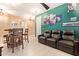 Spacious living room with comfortable seating, TV, and stylish decor at 18630 W Lawrence Ln, Waddell, AZ 85355