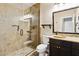 Bathroom featuring a glass shower, decorative backsplash, and framed mirror at 19777 N 76Th St # 3220, Scottsdale, AZ 85255