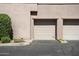Garage with well-maintained curb appeal featuring mature landscaping at 19777 N 76Th St # 3220, Scottsdale, AZ 85255