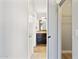 Hallway view showcasing bathroom vanity and closet at 19777 N 76Th St # 3220, Scottsdale, AZ 85255