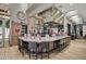 A modern communal kitchen offers bar seating and stainless steel appliances at 19777 N 76Th St # 3220, Scottsdale, AZ 85255