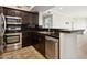 Well-equipped kitchen with stainless steel appliances and dark cabinetry at 19777 N 76Th St # 3220, Scottsdale, AZ 85255