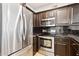 Updated kitchen with stainless steel appliances, modern cabinetry and hardware at 19777 N 76Th St # 3220, Scottsdale, AZ 85255