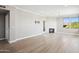 Spacious living room with fireplace, light wood floors and lots of natural light at 19777 N 76Th St # 3220, Scottsdale, AZ 85255