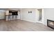 Open floor plan with living room, breakfast bar, and kitchen beyond at 19777 N 76Th St # 3220, Scottsdale, AZ 85255