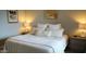 Beautifully staged main bedroom with soothing lighting and plush bedding for a relaxing ambiance at 19777 N 76Th St # 3220, Scottsdale, AZ 85255