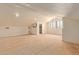 Attic interior featuring bright natural light, dormer windows, and fresh white paint at 2131 E Rose Garden Ln, Phoenix, AZ 85024