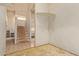 Unfinished basement interior featuring a stairwell and an area with a laundry sink at 2131 E Rose Garden Ln, Phoenix, AZ 85024