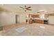 A large kitchen and living area, with potential for upgrades and renovations at 2131 E Rose Garden Ln, Phoenix, AZ 85024