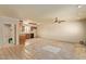 A large living area with adjacent kitchen with lots of potential at 2131 E Rose Garden Ln, Phoenix, AZ 85024