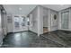 Bonus room with tile floor, backyard access, and an abundance of natural light at 228 N 65Th Pl, Mesa, AZ 85205