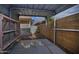 Covered patio view with concrete flooring and brick fencing at 228 N 65Th Pl, Mesa, AZ 85205