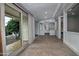 Sunroom with tile floors and open to the backyard at 228 N 65Th Pl, Mesa, AZ 85205