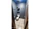 Bathroom featuring tiled floors, toilet, and modern accessories at 2320 W El Alba Way, Chandler, AZ 85224