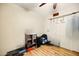 Bedroom with ceiling fan, laminated floors, and closet at 2320 W El Alba Way, Chandler, AZ 85224