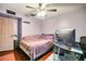 Bedroom with purple accents, carpet, and natural light at 2320 W El Alba Way, Chandler, AZ 85224