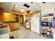 Bright kitchen features wood cabinets, tile floors, a breakfast bar and modern appliances at 2320 W El Alba Way, Chandler, AZ 85224