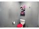 Clean and simple half bathroom with toilet and essential fixtures at 2320 W El Alba Way, Chandler, AZ 85224