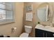 Well-maintained half bathroom with modern fixtures and a decorative vanity at 2331 E Sunland Ave, Phoenix, AZ 85040