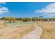 Well-maintained community park with basketball court and playground, perfect for outdoor activities at 2331 E Sunland Ave, Phoenix, AZ 85040