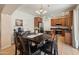 Cozy dining area that seamlessly transitions into a modern kitchen with stainless steel appliances at 2331 E Sunland Ave, Phoenix, AZ 85040