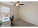 Bright office space featuring a desk, comfortable chair, and natural light, ideal for productivity at 2331 E Sunland Ave, Phoenix, AZ 85040