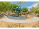 Community playground with modern play structures, providing a fun space for children to play at 2331 E Sunland Ave, Phoenix, AZ 85040