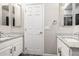 Modern bathroom with dual granite countertop sinks at 2409 W Red Range Way, Phoenix, AZ 85085