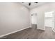 Bedroom with hard flooring and closet in a house for sale at 2409 W Red Range Way, Phoenix, AZ 85085
