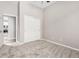 Bedroom with gray carpet and closet in a house for sale at 2409 W Red Range Way, Phoenix, AZ 85085