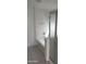 Bathroom featuring a white bathtub and a shower with sliding glass doors at 26022 N Sandstone Way, Surprise, AZ 85387