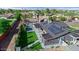 Aerial view showcasing a well-maintained backyard with a sparkling pool and a lush green lawn at 2656 N 84Th Pl, Scottsdale, AZ 85257
