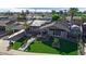 Inviting home with modern landscaping, artificial turf, and solar panels for energy savings at 2656 N 84Th Pl, Scottsdale, AZ 85257