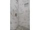 Tiled shower with marble pattern at 2656 N 84Th Pl, Scottsdale, AZ 85257