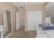 This bright bedroom offers great natural light and features a full-length mirror, closet, and a vanity with a desk at 3349 E Merlot St, Gilbert, AZ 85298