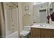 This bathroom has a shower and bathtub combo, toilet, and vanity with sink and mirror at 3510 E Hampton Ave # 74, Mesa, AZ 85204