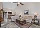 Cozy living room featuring tile floors, vaulted ceilings, and stylish furnishings at 3510 E Hampton Ave # 74, Mesa, AZ 85204