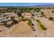 Bird's eye view capturing the extensive acreage, complete with horse amenities and residential structures at 3738 E Hash Knife Draw Rd, Queen Creek, AZ 85140