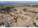 Scenic aerial capture of the property, emphasizing its considerable acreage and quiet, community atmosphere at 3738 E Hash Knife Draw Rd, Queen Creek, AZ 85140