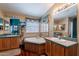 Bathroom featuring a large soaking tub and dual sinks at 3738 E Hash Knife Draw Rd, Queen Creek, AZ 85140