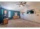 Bright bedroom with a vaulted ceiling, fan, and carpet flooring at 3738 E Hash Knife Draw Rd, Queen Creek, AZ 85140