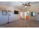 Bedroom with carpet, ceiling fan, and an ensuite bathroom at 3738 E Hash Knife Draw Rd, Queen Creek, AZ 85140