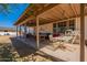 Spacious covered patio, perfect for outdoor dining and entertaining at 3738 E Hash Knife Draw Rd, Queen Creek, AZ 85140