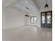 Bright and airy living room features modern lighting and neutral tile floors at 39302 N 30Th Dr, Phoenix, AZ 85086