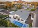 Expansive aerial view of a home with a modern pool and meticulously landscaped yard at 4002 N 33Rd Pl, Phoenix, AZ 85018